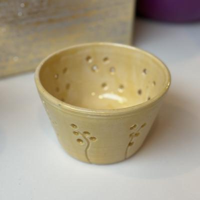 Yellow tea light holder