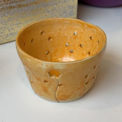 Orange tea light holder